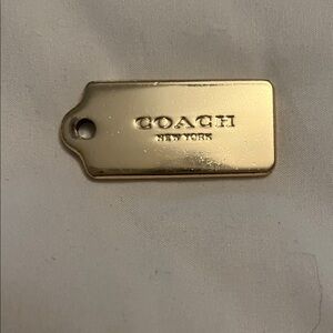Coach Shiny Gold Tag